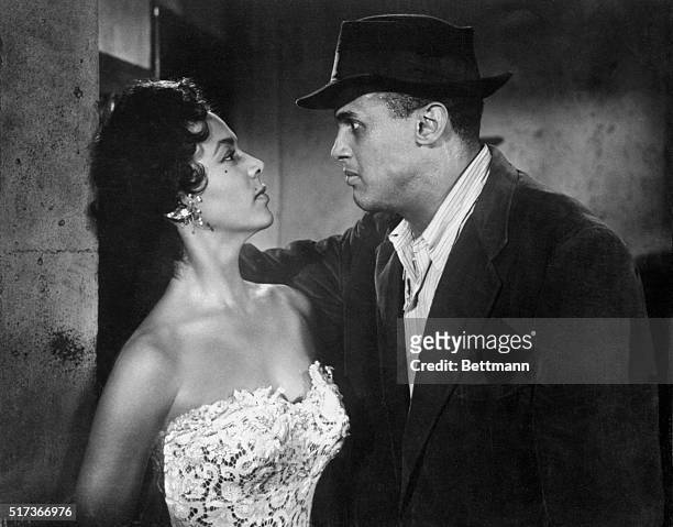 Dorothy Dandridge and Harry Belafonte in scenes from the film contemporary version of the Bizet opera, Carmen Jones. Directed by Otto Preminger.