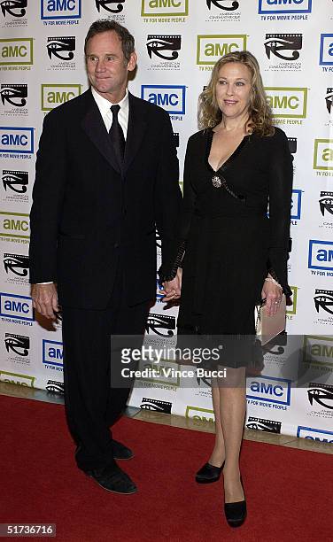 Actress Catherine O'Hara and husband Bo Welch arrive at the 19th American Cinematheque Awards to honor Steve Martin at the Beverly Hilton Hotel on...