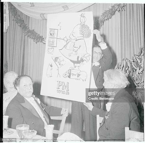 Boston: Birthday Cartoon. A near life-size caricature of Pierre Monteux draws a laugh from the famed French conductor at a Boston party celebrating...