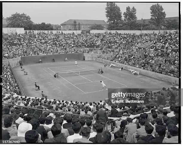 Davis Cup Event Opens. Tokyo, Japan: Thousands of tennis fans are packed in Denen Coliseum Bowl here for the opening of the three day Eastern Zone...