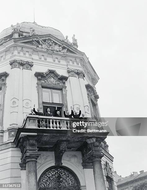 After Austrian Signing. Vienna, Austria: Waving from a balcony of Vienna's Belvedere Palace after signing of the Austrian State Treaty are : French...