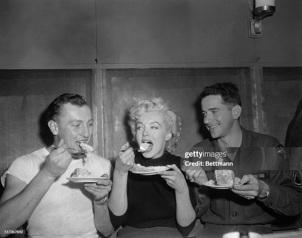 Marilyn Monroe Eating Cake