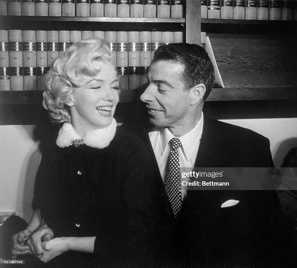 Marilyn Monroe and Joe DiMaggio Smiling