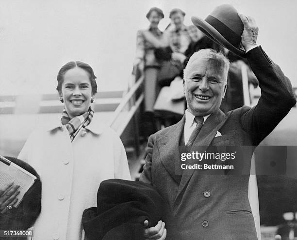 Hello, London -- Goodbye, U.S.A. London, England: With a tip of the hat and wide smiles, famed film comedian Charles Chaplin and his wife, Oona, give...