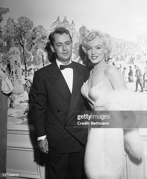 Marilyn Monroe and Alan Ladd Attending Photoplay Magazine awards ceremony, held the Beverly Hills Hotel, March 8, 1954.