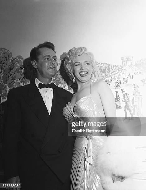 Marilyn Monroe and Alan Ladd Attending Photoplay Magazine Awards ceremony, held the Beverly Hills Hotel, March 8, 1954.