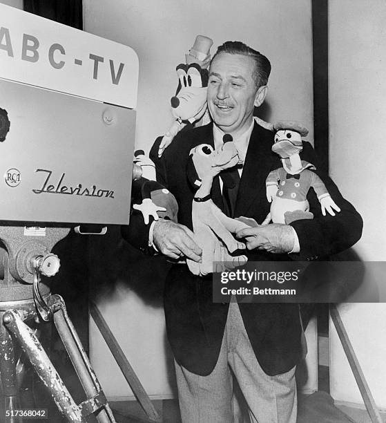 After more than a year of study and exploration of the television field, Walt Disney today signed an exclusive long term agreement with the American...