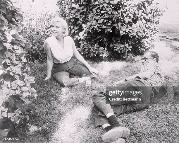 Marilyn Monroe with husband Arthur Miller rehersing between scenes of The Misfits.