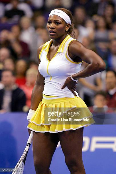 Serena Williams reacts after losing a point in the second set against Lindsay Davenport during their Round Robin match at the WTA Tour Championships...