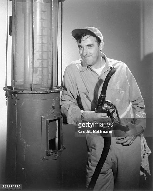 Jim Nabors, a young actor singer is shown in this photo as a hick gasoline station attendant on The Andy Griffith Show, a television series.