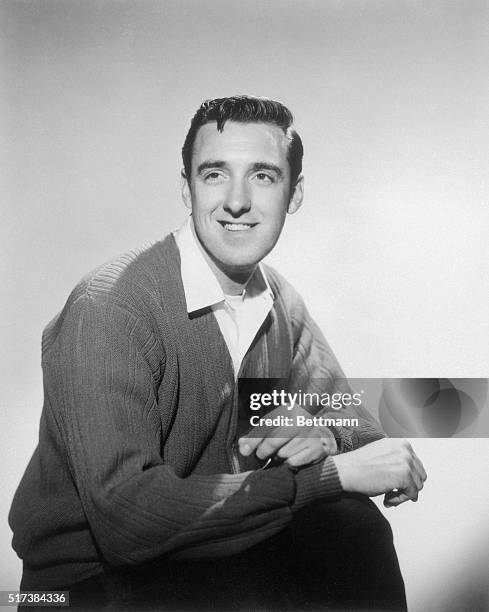 Jim Nabors, a young actor singer is shown in this photo as a hick gasoline station attendant on The Andy Griffith Show, a television series.