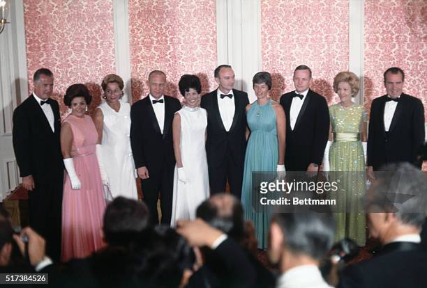 President and Mrs. Nixon and Vice-President and Mrs. Agnew pose with their guests of honor, the Apollo 11 astronauts and their wives before the state...