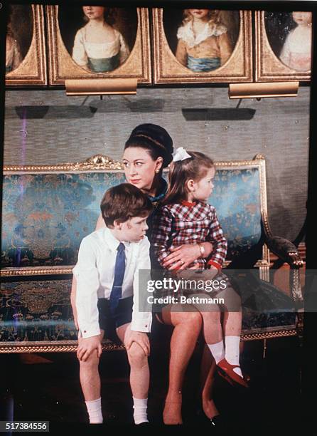 Princess Margaret is shown here with her two children, Viscount Linley and Lady Sarah Armstrong-Jones at Windsor Castle, during recent filming of the...