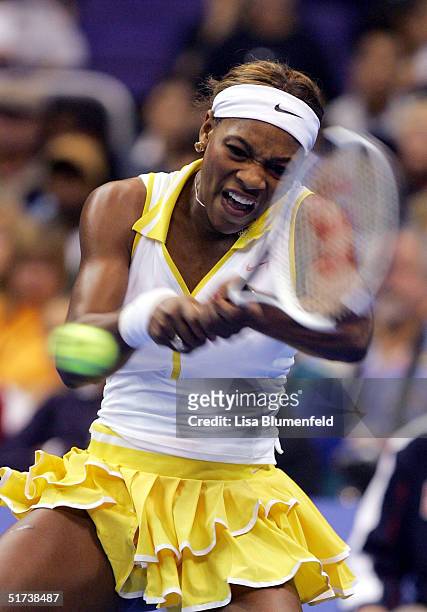 Serena Williams returns the ball to Lindsay Davenport during their Round Robin match at the WTA Tour Championships Tournament on November 13, 2004 at...