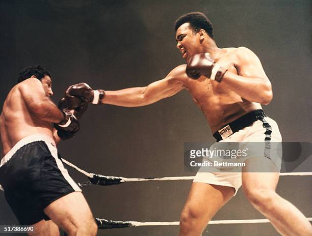 Heavyweight champions Muhammad Ali and Rocky Marciano boxing in composited film created in 1970.