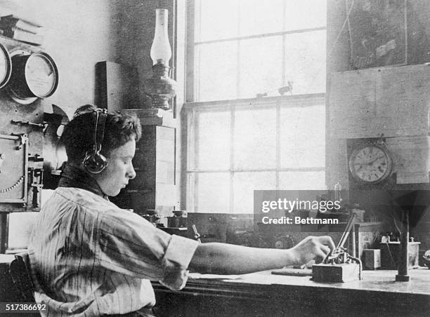 David Sarnoff, future president of RCA and NBC, operates a telegraph key at a wireless station in Siasconset on Nantucket Island.