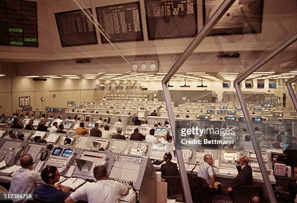 Kennedy Space Center, Florida: Personnel in Firing Room 2 of the Launch Control Center monitor pre-launch activities prior to the lift off of Apollo...