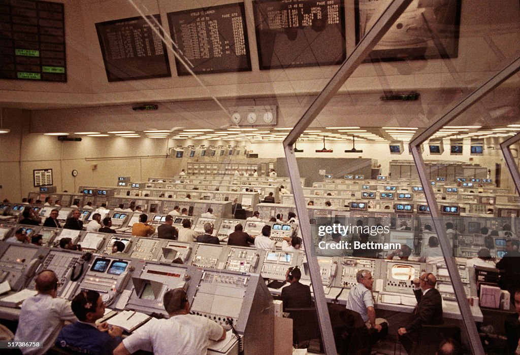 Apollo Launch Control Personnel in Firing Room 2 of the Launch Control Center monitor... News ...