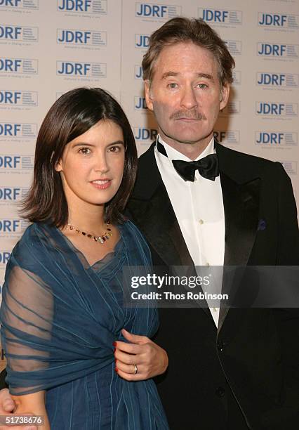 Actor Kevin Kline and wife, actress Phoebe Cates attend the Annual Promise Ball at the American Museum of Natural History on November 13, 2004 in New...