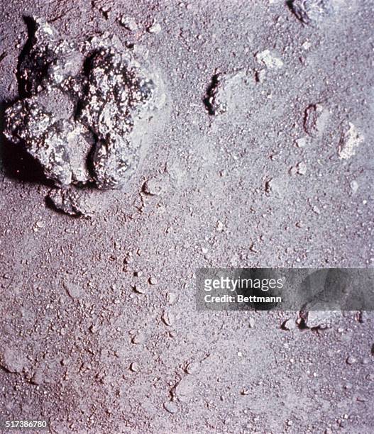 Moon - This photo of a lunar rock was taken during the Apollo 12 EVA on the lunar surface. The camera was a 35mm stereo close up camera . The image...