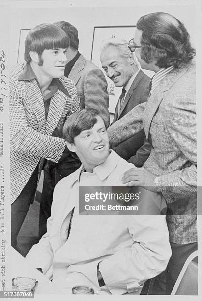 Cincinnati Reds Outfielder Pete Rose and Reds Pitcher Clay Carrol greet player representative Marvin Miller and Player Attorney Dick Moss as they...