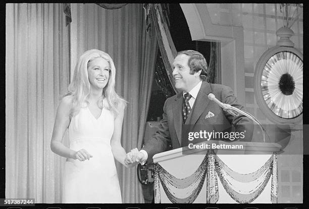 Miami Beach: Joan Kennedy smiles as she shares a joke with Alan King during the Democratic Telethon here early.