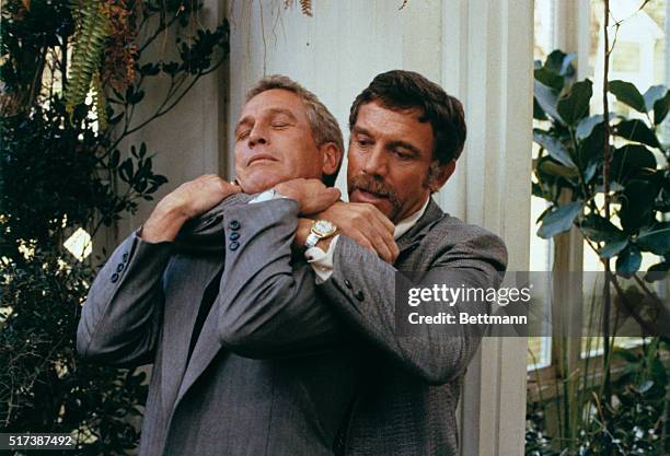 Paul Newman as Harper is hammerlocked by Tony Franciosa, who portrays a southern police chief, Broussard in the film The Drowning Pool filmed on...