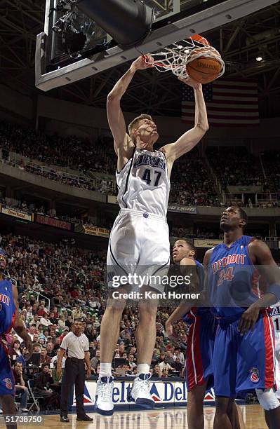 Andrei Kirilenko of the Utah Jazz dunks against the Detroit Pistons on November 13, 2004 at the Delta Center in Salt Lake City, Utah. NOTE TO USER:...