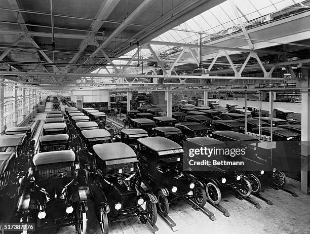 MODEL T FORDS ARRAYED FOR DELIVERY AFTER LEAVING ASSEMBLY LINE.PHOTOGRAPH, 1925.