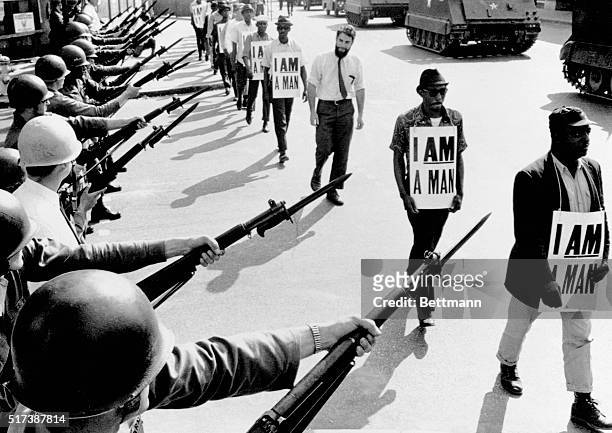 Civil Rights activists are blocked by National Guardsmen brandishing bayonets while trying to stage a protest on Beale Street in Memphis, Tennessee....