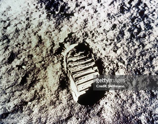 Tranquility Base, The Moon: This photo made July 21st from the Lunar Module shows in fine detail the impression made in the lunar soil by Apollo 11...