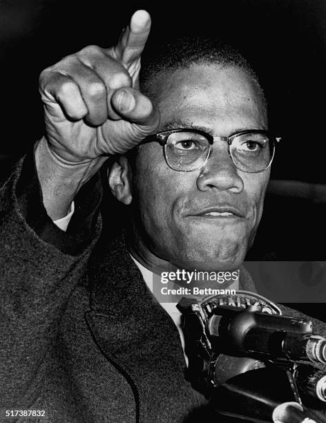 Nation of Islam National Minister Malcom X addresses a rally on May 14 in Harlem in support of desegregation in Birmingham, Alabama.