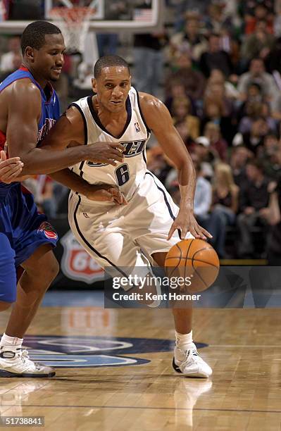 Howard Eisley of the Utah Jazz dribbles up court against the Detroit Pistons on November 13, 2004 at the Delta Center in Salt Lake City, Utah. NOTE...