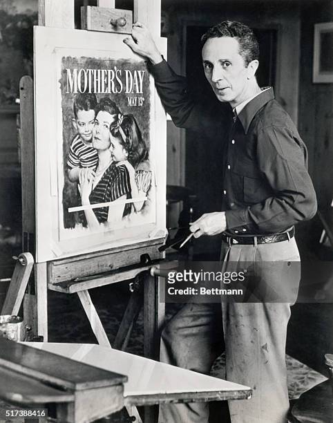 Norman Rockwell American painter and illustrator, at work on official 1951 Mother's Day poster. Photograph.
