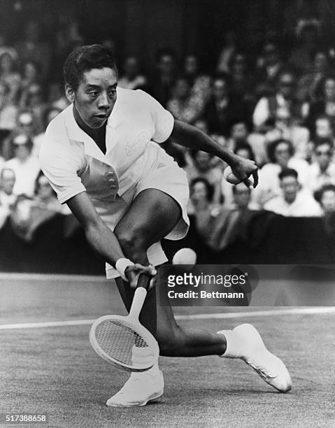 London, England: Althea Gibson in a Wimbledon match which she lost with Beverly Baker.