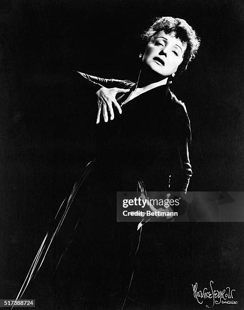 Dramatic portrait of French chanteuse Edith Piaf. Photo filed 9/7/1955. BPA2