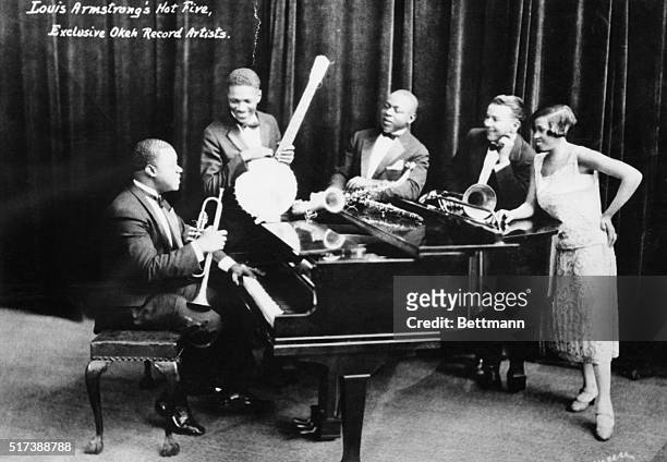 The recordings of Louis Armstrong's Hot Five would prove to be some of the most influential in Jazz. The Hot Five, from left to right, were,...
