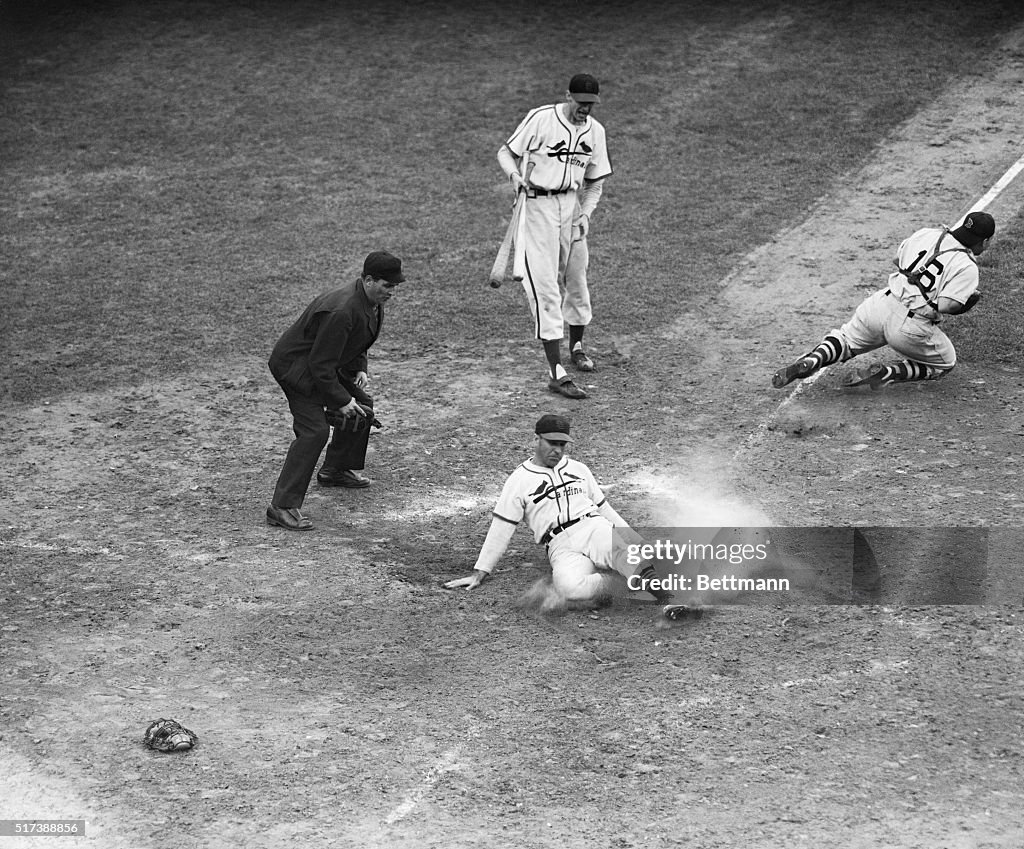 Enos Slaughter Sliding Into Home Plate