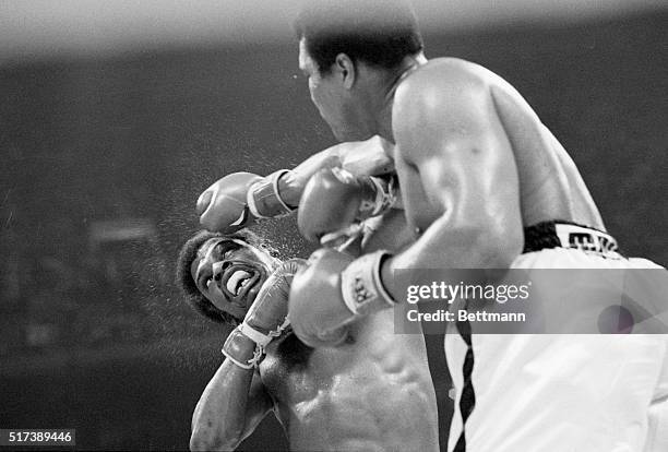 Muhammad Ali punches Leon Spinks during their world heavyweight title match on September 15 at the Louisiana Superdome in New Orleans, Louisiana, USA.