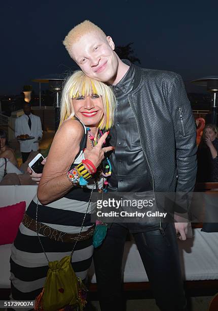 Designer Betsey Johnson and Model Shaun Ross attend Betsey Johnson's Pool Party at Sunset Tower Hotel on March 24, 2016 in West Hollywood, California.