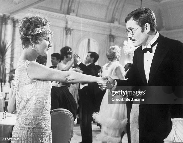 London, England-The setting is formal, the very proper dining room of London's Savoy, and the principals appear to be eyeing each other seriously....