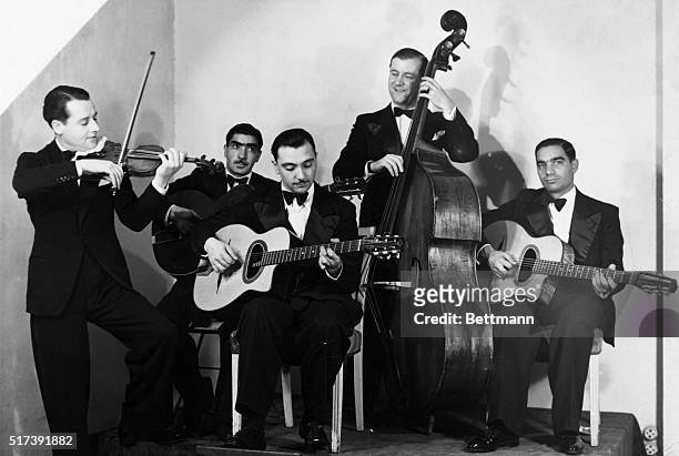 Django Reinhardt and Stephane Grappelli, of the Quintet de Hot Club de France. Photograph, ca. 1934.