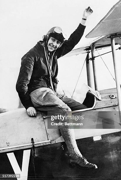 London, England-: Miss Amy Johnson, 22 year old Aviatrix of England, who hopped off this morning on her attempted solo flight to Australia 000 miles...