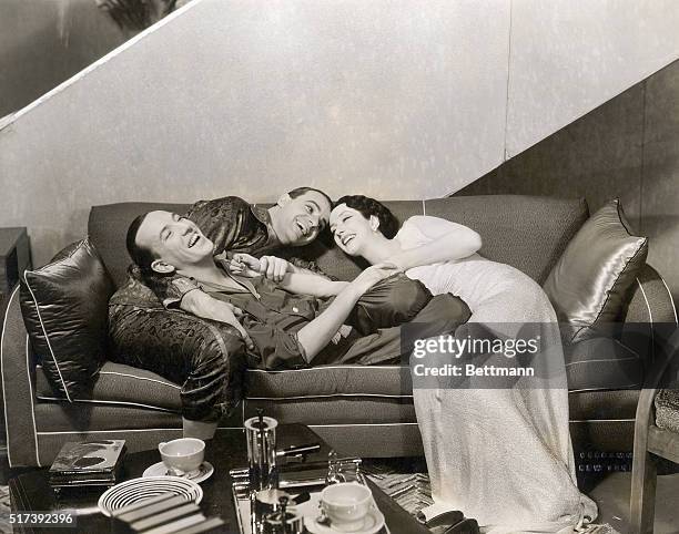 Alfred Lunt, Noel Coward and Lynn Fontaine, in the Noel Coward play, "Design for Living."