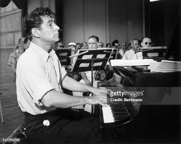 Leonard Bernstein conducting, and playing the piano.