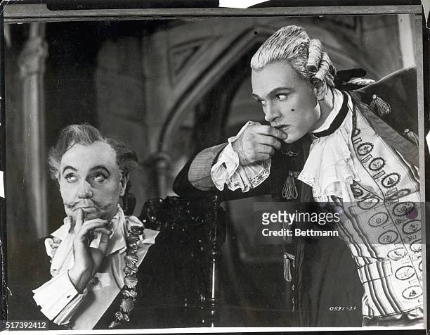 New York, New York: Picture shows actors, Ralph Richarson as lord Burleigh, and Laurence olivier as mr. Puff, in the priduction of, "The Critic."...