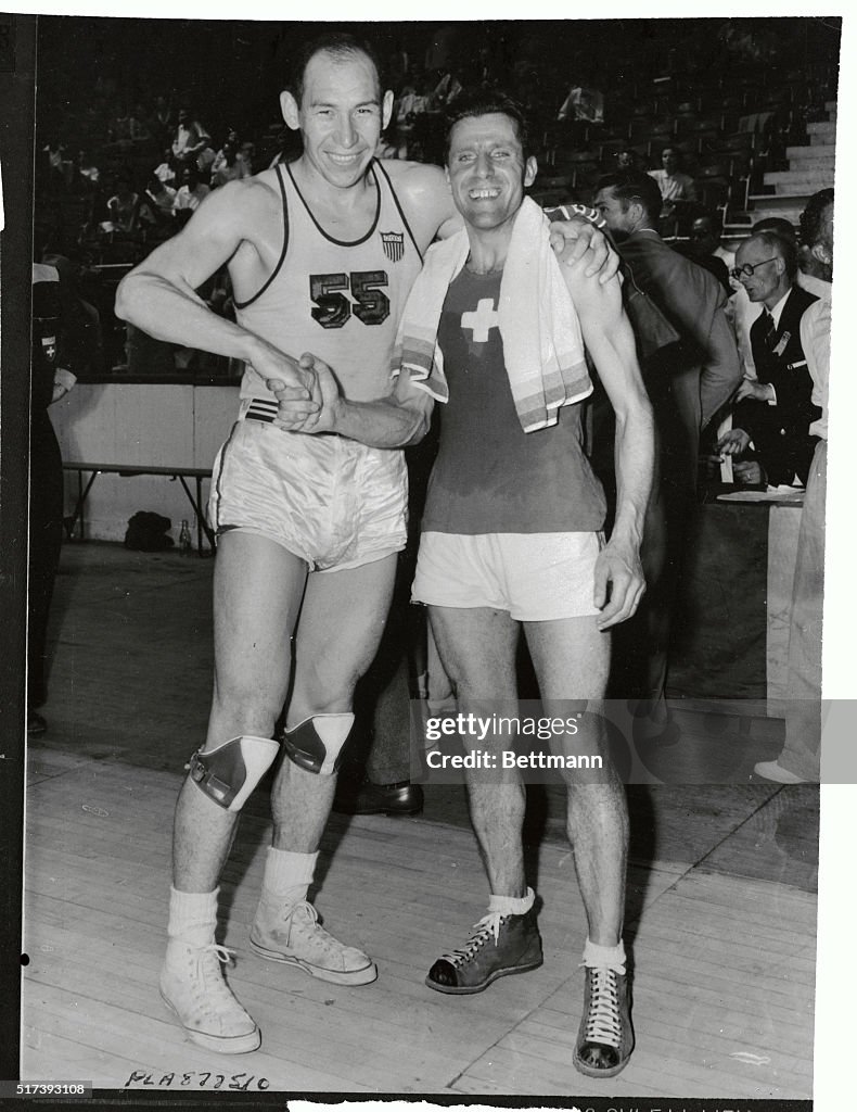 Captains of Olympic Basketball Teams Shaking Hands
