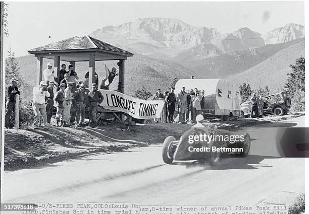 Unser Finishes Trial Heat. Pikes, Peak, Colorado: Louis Unser, 8-time winner of the annual Pikes Peak Hill Climb, crosses the finish line 2nd in time...