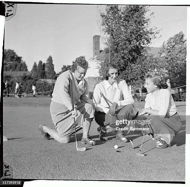 Marlene Bauer, Los Angeles shows how she missed the 18th hole by inches after a 25-yard approach shot from below the green. Besides Marlene Bauer,...