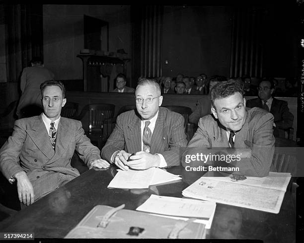 Harry Bridges, Henry Schmidt and J.R. Robertson, ILWU officials that are charged with perjury and on trial here are shown in meditative moods during...